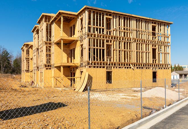 a snapshot of temporary chain link fences protecting a large construction project from unauthorized access in Mundelein